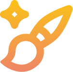 Paint brush with sparkle icon in orange gradient